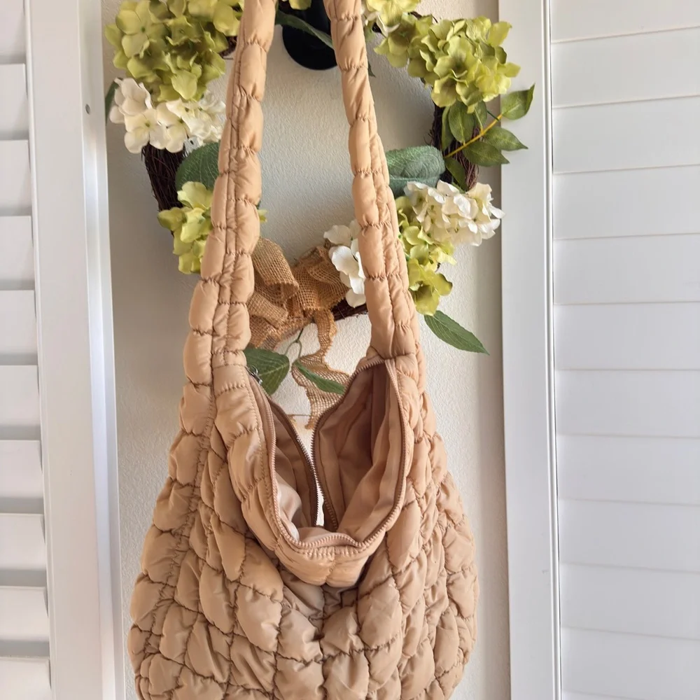 Boutique. Tan Quilted Hobo Bag